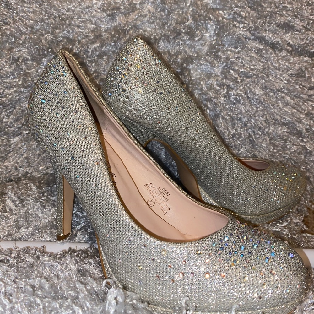 Beautiful silver heels.